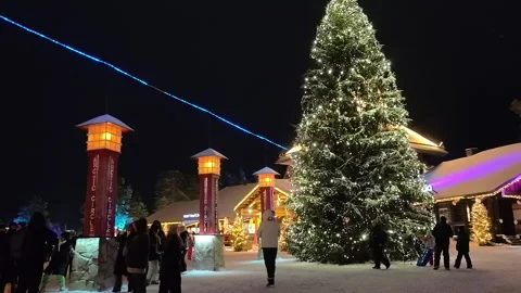 Christmas tree and Arctic Circle pillars in Santa Claus Village, Rovaniemi 動画素材 344834569