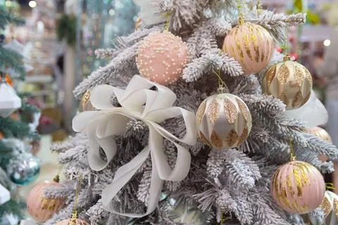 Christmas tree and elegant decorations in a store Stock Photos
