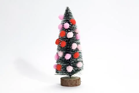 Christmas tree and pompoms Stock Photos