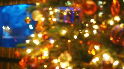 Christmas tree and tv viewed throught the window from city downtown street. Stock Footage 58554289