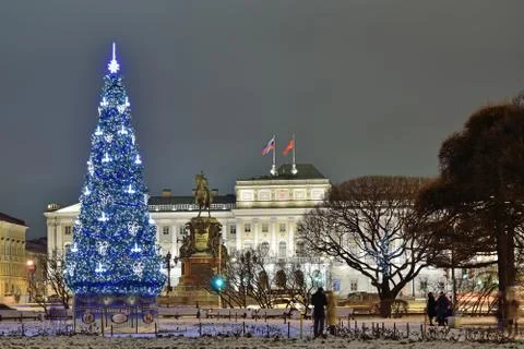 Christmas tree on the background of the Legislative Assembly of St. Petersbur Stock Photos
