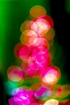Christmas tree background of true camera bokeh. glitter and light abstract. Stock-Fotos