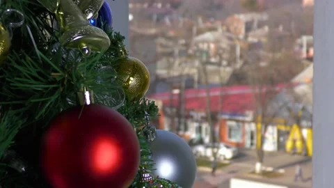 Christmas tree on the background of the view from the window with blur. B roll Stock Footage 165090219