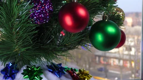 Christmas tree on the background of the view from the window with blur. B roll Stock Footage 165090224