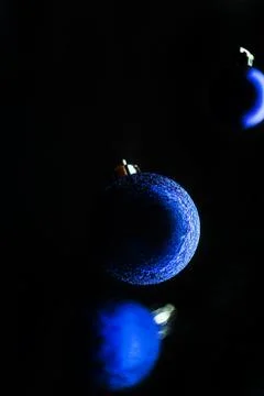 Christmas tree ball on black background Stock Photos