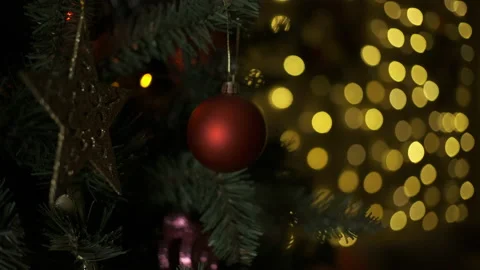 Christmas tree with balls on the background of bright festive lights. Stock Footage 146078165