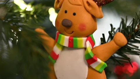 Christmas tree, bear with scarf looking at it from bottom to top Stock Footage 227713965