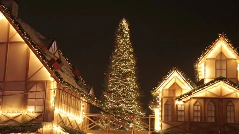 Christmas tree between two half-timbered houses. Fairytale Christmas location. Stock Footage 197474659