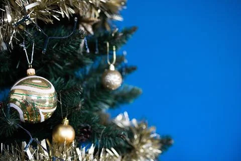 Christmas tree on a blue background Stock Photos