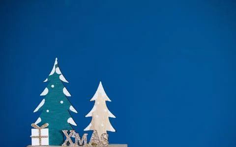 Christmas tree on a blue background Stock Photos
