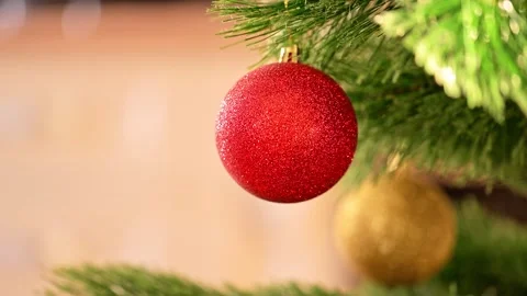 Christmas tree on blurred background, decorated with red ornaments Stock Footage 278211474