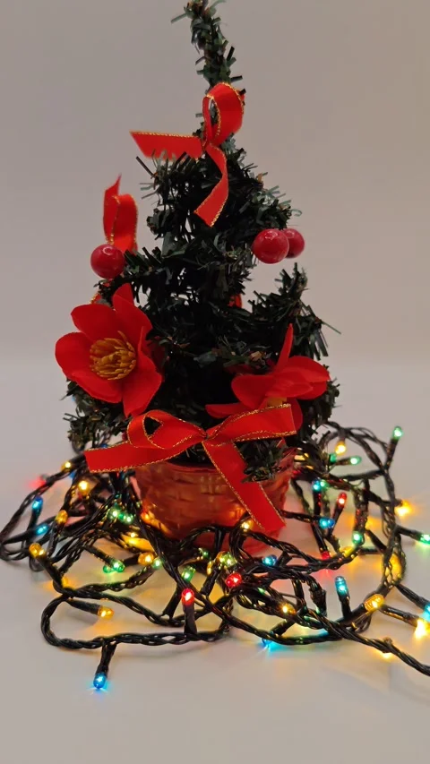 Christmas tree with a bow on a white background Video stock 322539849
