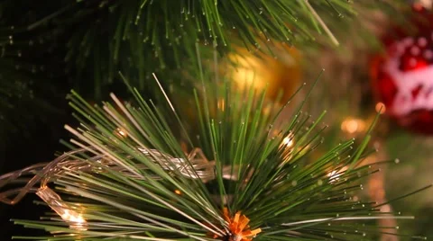 Christmas tree branch closeup with blinking lights 動画素材 47747643
