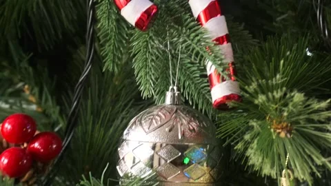Christmas tree branches with red baubles evoke holiday magic. Stock Footage 291489828