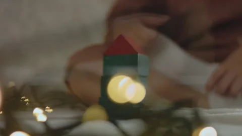 Christmas tree built with colored constructor pieces. Close up shooting Stock Footage 253904708