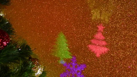 Christmas tree. Carousel of silhouettes of Christmas trees and snowflakes. Stock-Footage 202039448