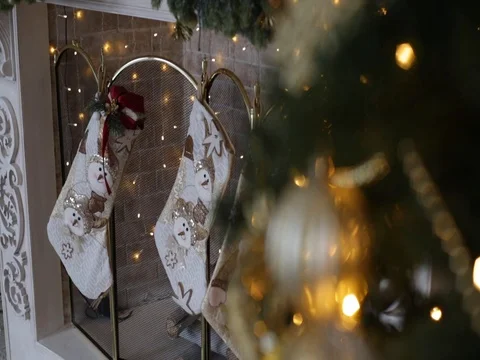 Christmas tree closeup and fire in fireplace on background Stock Footage 70874545