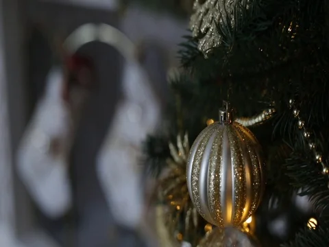 Christmas tree closeup and fire in fireplace on background Stock Footage 70874970