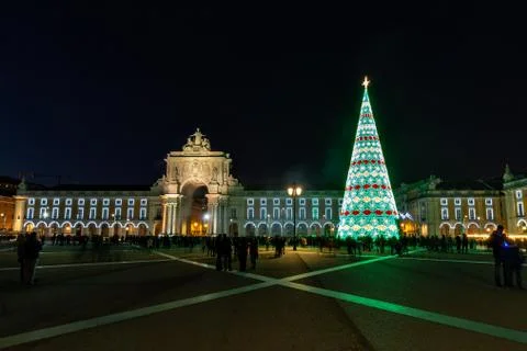Christmas tree on Commerce square at night in Lisbon, Portugal Stock Photos