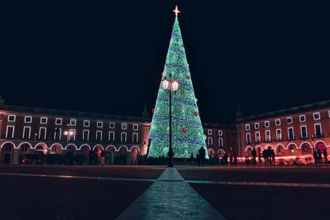 Christmas tree on Commerce square at night in Lisbon, Portugal Stock Photos