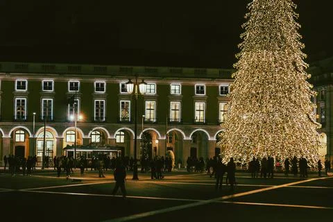 Christmas tree on Commerce square at night in Lisbon, Portugal Stock Photos