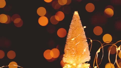 Christmas tree on dark background with shining bokeh Stock Footage 217678112