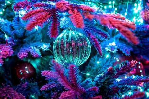 Christmas tree decorated with ball, background blur with led lights, bokeh Foto stock