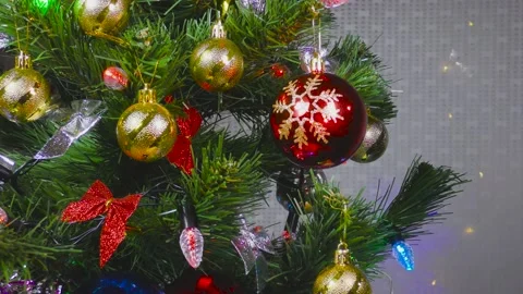 Christmas tree decorated with big pears and a gerland on a white background Stock Footage 144749323
