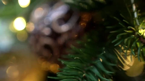 Christmas tree decorated with christmas tree toys and shining lights, close-up Video stock 83566371