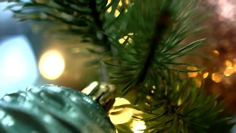 Christmas tree decorated with christmas tree toys and shining lights, close-up Vídeo Stock 83566448