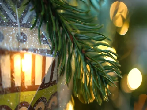 Christmas tree decorated with christmas tree toys and shining lights, close-up Video stock 83566480
