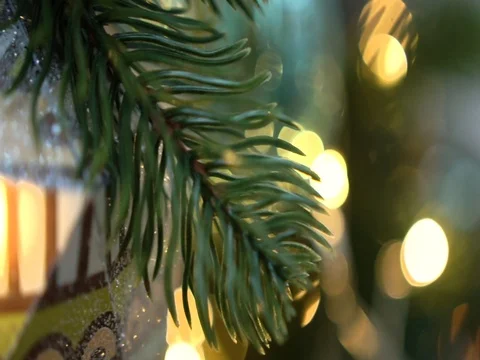 Christmas tree decorated with christmas tree toys and shining lights, close-up Video stock 83566530