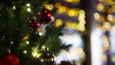 Christmas tree decorated with christmas tree toys and shining lights, close-up Stock Footage 231369964
