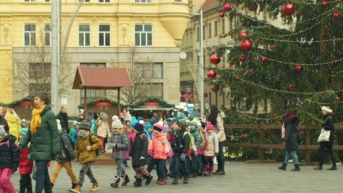 Christmas tree decorated flasks red, children kindergarten wooden bell tower Stock Footage 100127269