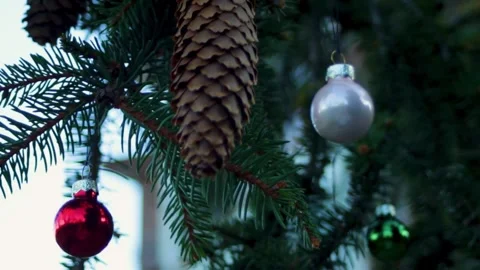 The Christmas tree is decorated with New Year's balls. Christmas tree glass Stock Footage 296401980