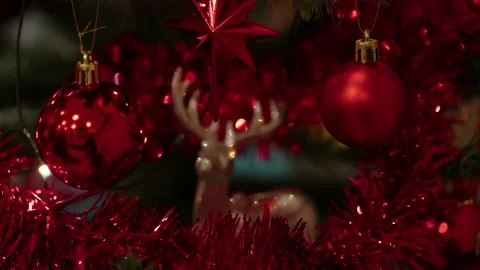 Christmas tree decorated with red balls and flickering lights. Holiday Stock Footage 190092560