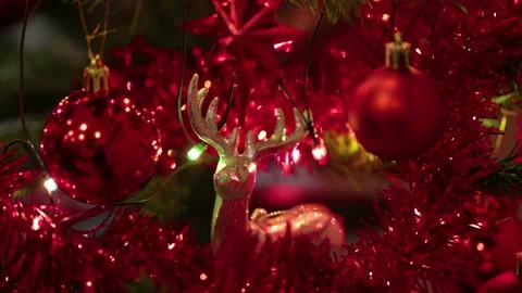 Christmas tree decorated with red balls and flickering lights. Holiday Stock Footage 202226134
