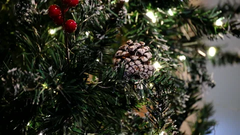A christmas tree decorated with sparkly christmas tree toys and shining lights 스톡 동영상 297784845