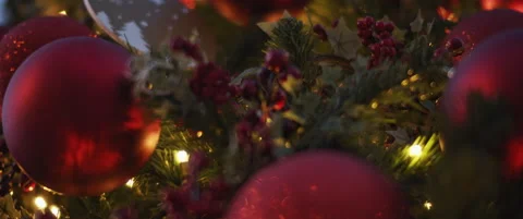 Christmas tree decorated with traditional red toys on the streets of the city Stock Footage 141362854