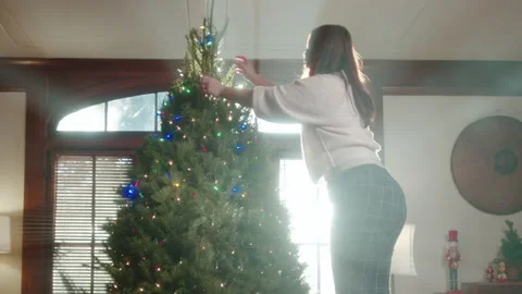 Christmas Tree Decorating 4K 48FPS SLO-MO Stock Footage 144462546