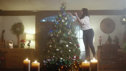Christmas Tree Decorating 4K 48FPS SLO-MO Stock Footage 144462675