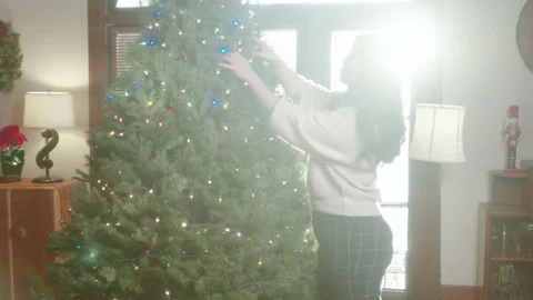 Christmas Tree Decorating 4K 48FPS SLO-MO Stock Footage 144462860