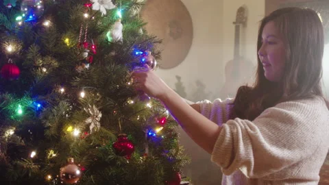 Christmas Tree Decorating 4K 48FPS SLO-MO Stock Footage 144462885