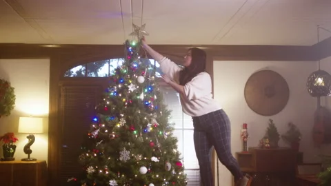 Christmas Tree Decorating 4K 48FPS SLO-MO Stock Footage 144462973