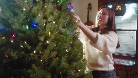 Christmas Tree Decorating 6K 48FPS SLO-MO Stock Footage 144463200