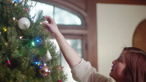 Christmas Tree Decorating 6K 48FPS SLO-MO Video stock 144463465