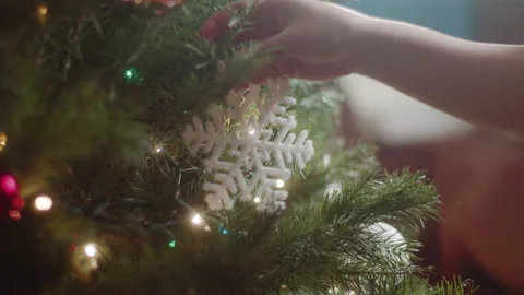 Christmas Tree Decorating 6K 48FPS SLO-MO Video stock 144463546