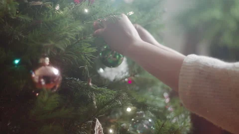 Christmas Tree Decorating 6K 48FPS SLO-MO Video stock 144463557