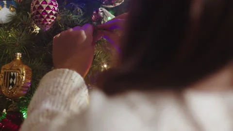 Christmas Tree Decorating 6K 48FPS SLO-MO Video stock 144464106
