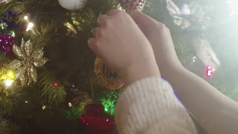 Christmas Tree Decorating 6K 48FPS SLO-MO Video stock 144464148